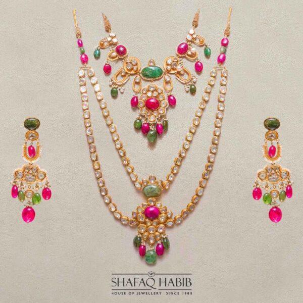 Multi Colour Bridal Jewelry set in gold with long neklace earring pair by shafaq habib at the best online prices in pakistan