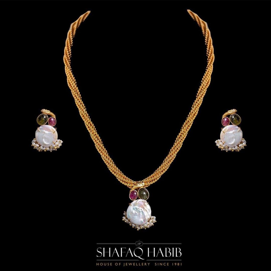 gold pendant set with pearl by shafaq habib