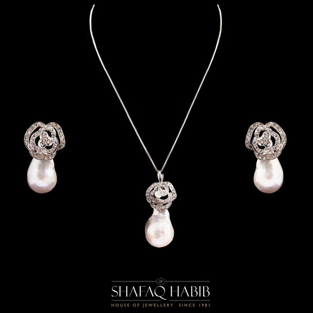diamond pendant set with pearl with earring pair by shafaq habib