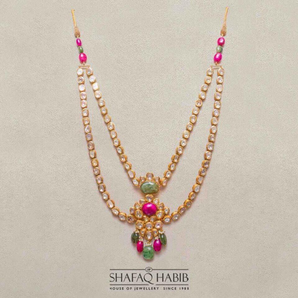designer gold jewelry with polki diamond emerald ruby and pearls design by Shafaq Habib