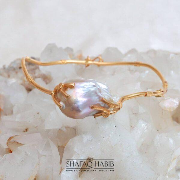 twig bangle with pink pearl in gold by shafaq habib at the best online prices in pakistan