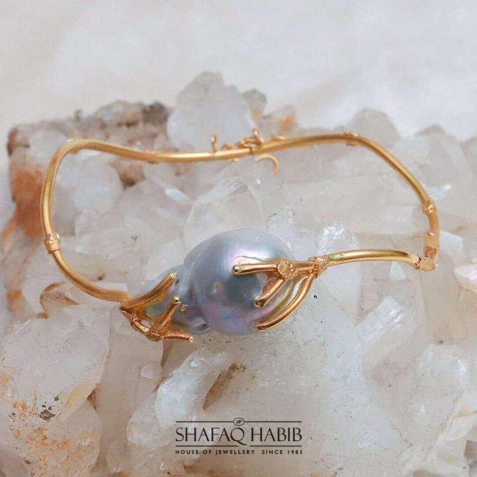 twig bangle in gold with grey pearl by shafaq habib at the best online price in Pakistan